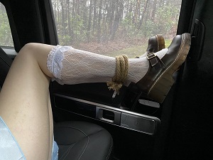 belle delphine legs tied up together so she can't move 