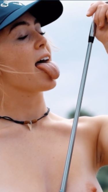 Grace Charis pretending to lick a golf club so you can imagine it's your cock 